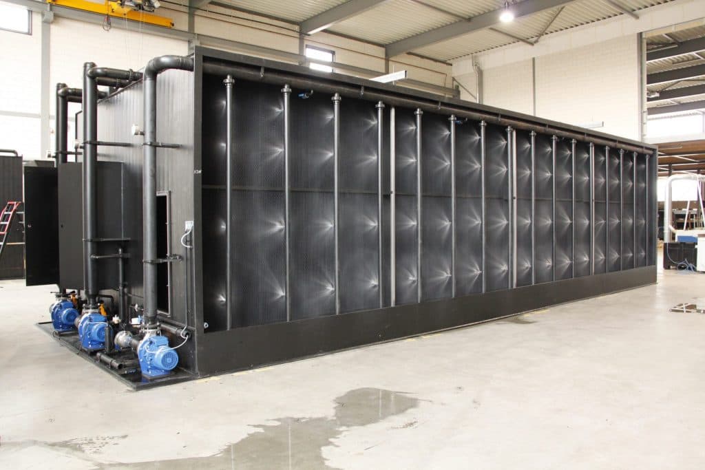 Biological air scrubber to capture ammonia emissions from livestock housing. Picture source: https://www.hollandaqua.nl/projects/biological-air-scrubber/  